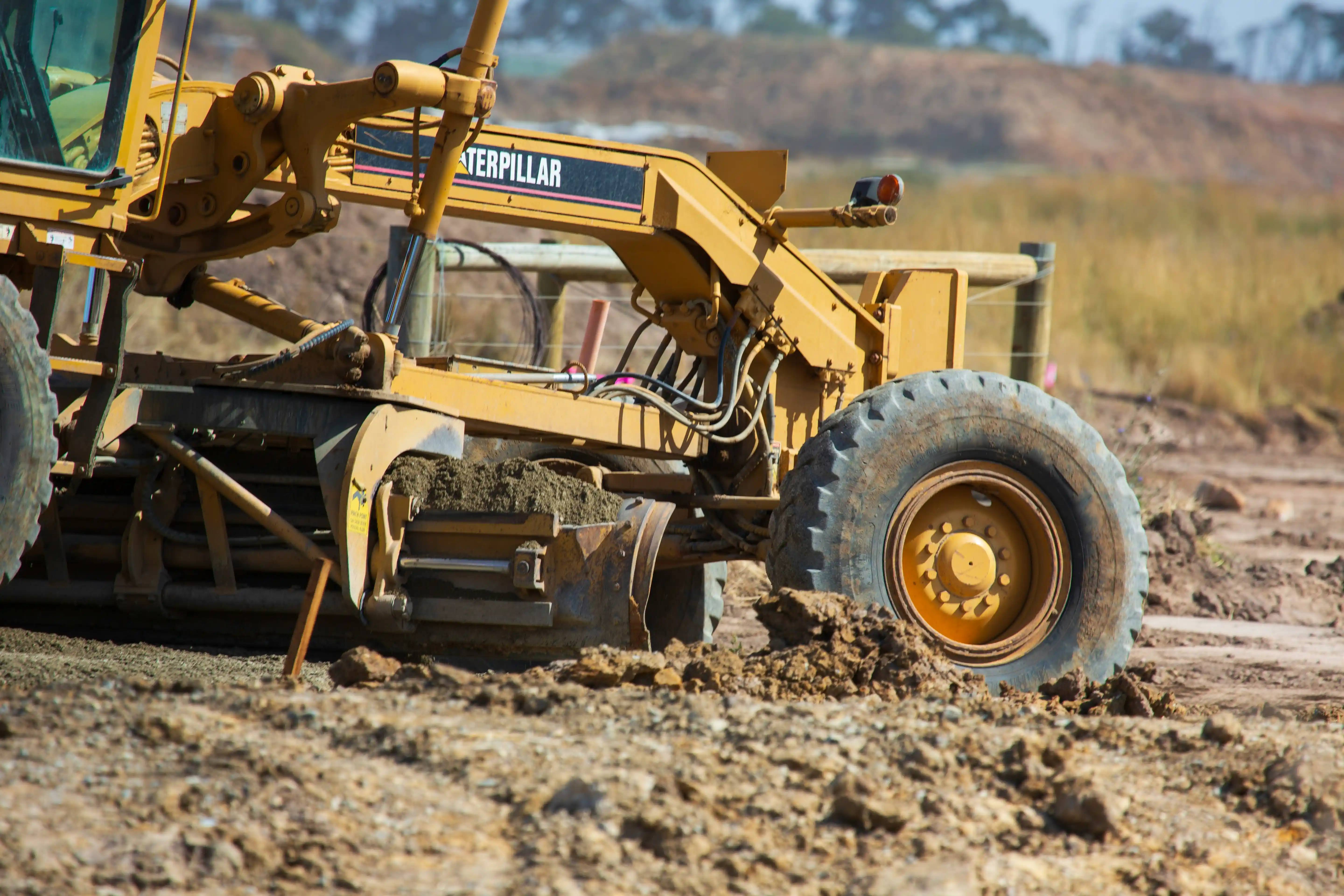 Motor grader for equipment rental operations